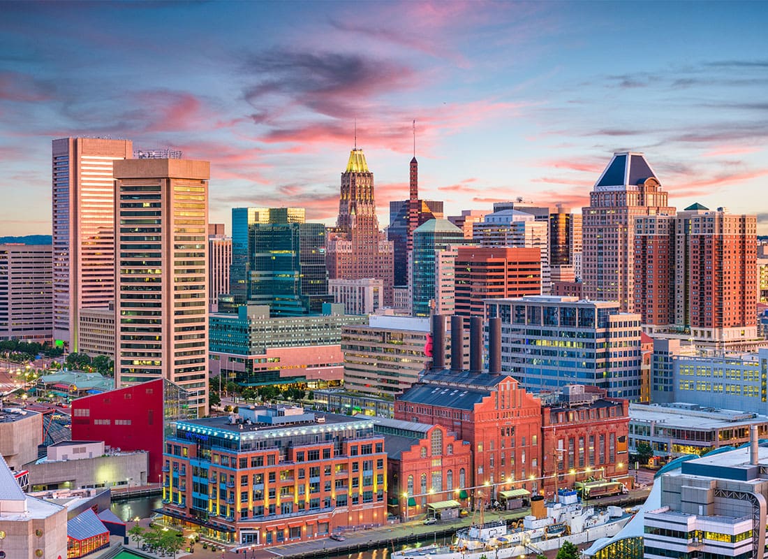 Baltimore, MD - Scenic View of the City Skyline in Baltimore, MD During Sunset